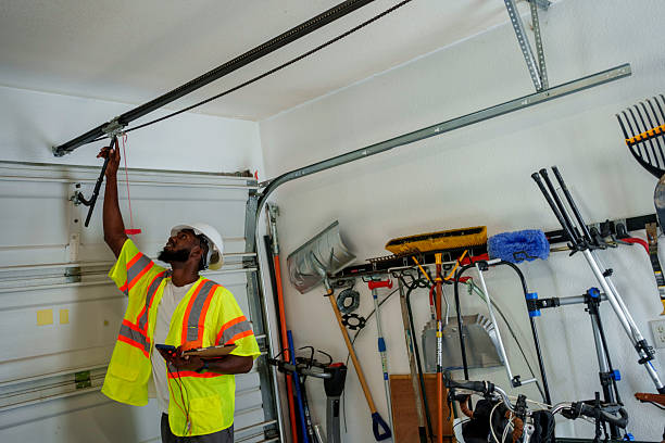 Professional Garage Door Panel Replacement technician working in Tulsa County County, OK